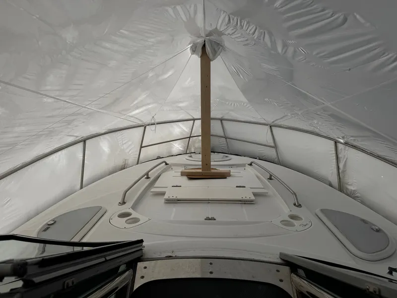 Slide: The Image of Monterey 335 Sport Yacht 2016 under cover in winter storage. - 13