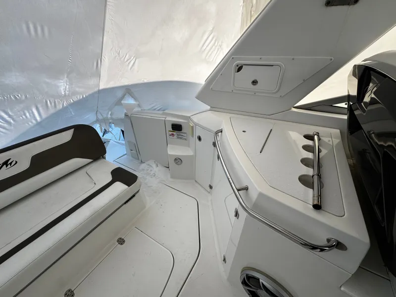 Slide: The Image of Interior of a 2016 Monterey 335 Sport Yacht with seating area. - 16