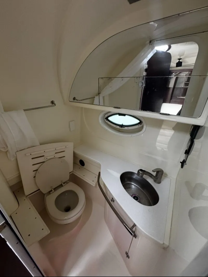 Slide: The Image of 2016 Monterey 335 Sport Yacht bathroom with sink and toilet. - 21