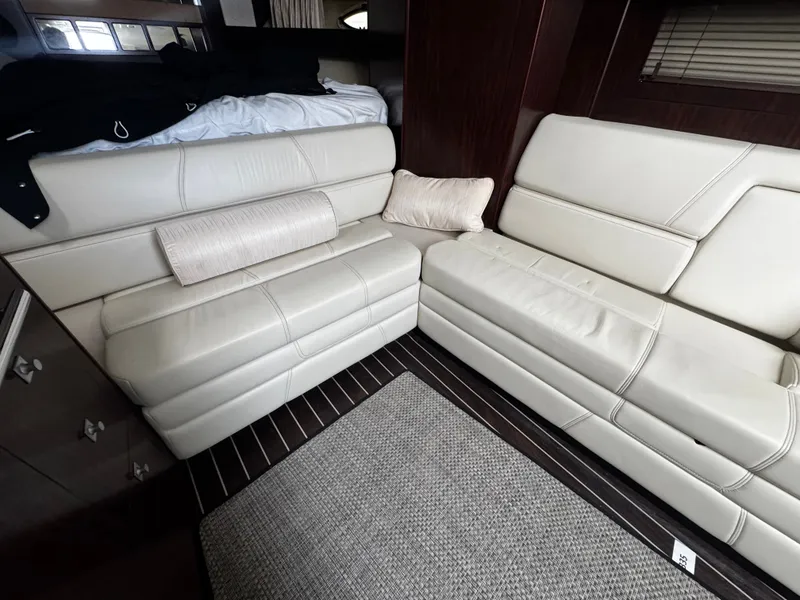 Slide: The Image of Interior of 2016 Monterey 335 Sport Yacht with beige leather sofas. - 23