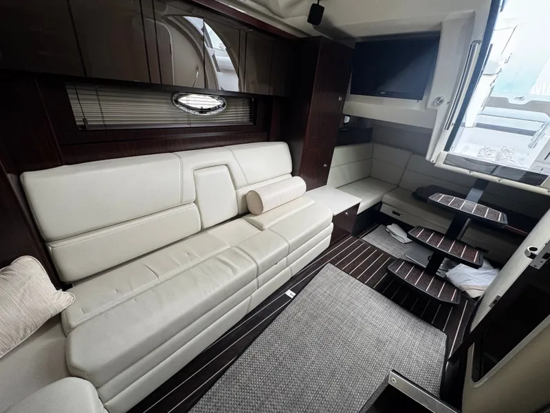 Slide: The Image of Interior of 2016 Monterey 335 Sport Yacht with elegant leather seating. - 24