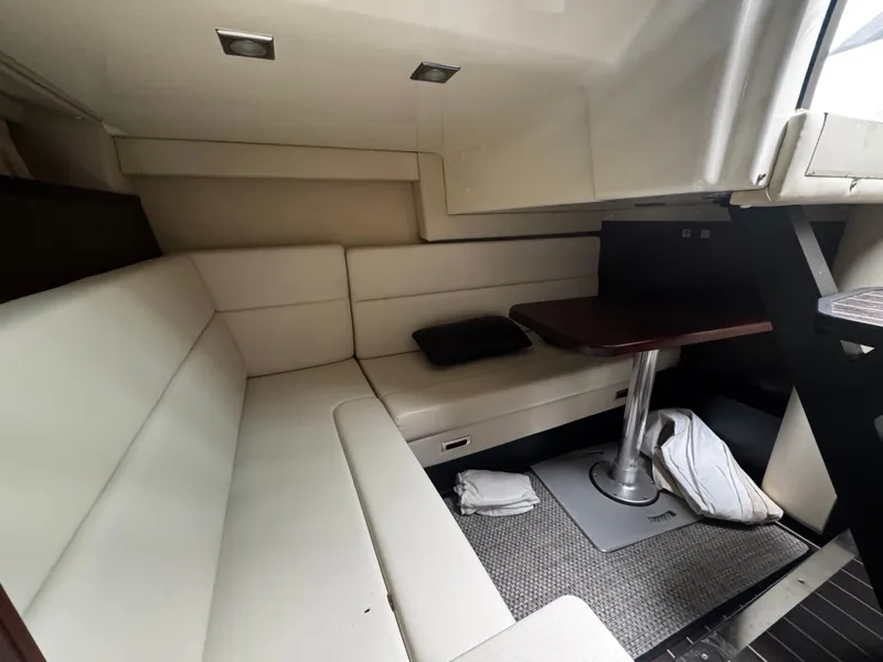 Slide: The Image of Interior of 2016 Monterey 335 Sport Yacht with seating area. - 25