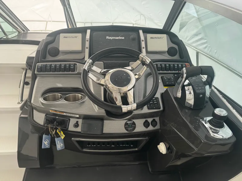 Slide: The Image of Helm console of the 2016 Monterey 335 Sport Yacht. - 6