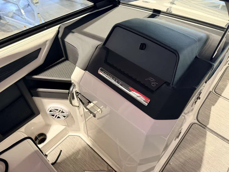 Slide: The Image of Interior of 2025 Cobalt R6 boat with speaker and storage. - 35