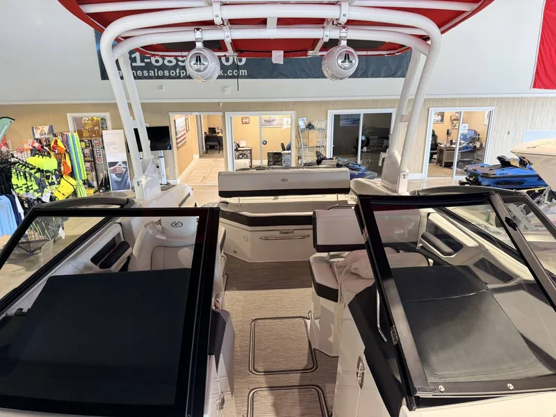 Slide: The Image of Interior view of 2025 Cobalt R6 boat in a showroom. - 39