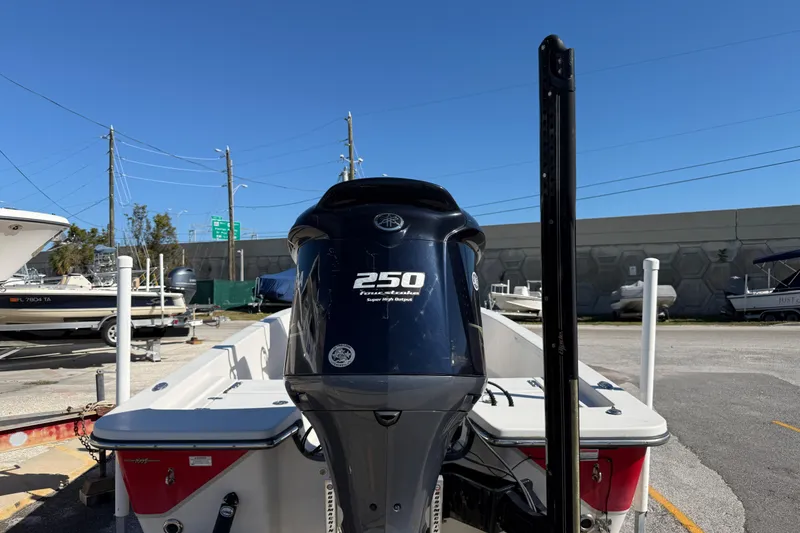 Slide: The Image of 2017 Blazer Bay 2220 Fisherman boat with 250 horsepower engine, parked outdoors. - 6