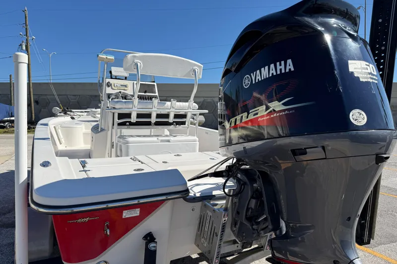 Slide: The Image of 2017 Blazer Bay 2220 Fisherman boat with Yamaha outboard motor, docked outdoors. - 7