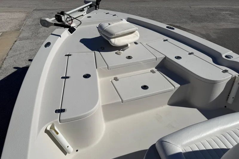 Slide: The Image of 2017 Blazer Bay 2220 Fisherman boat deck with storage compartments and seating. - 8