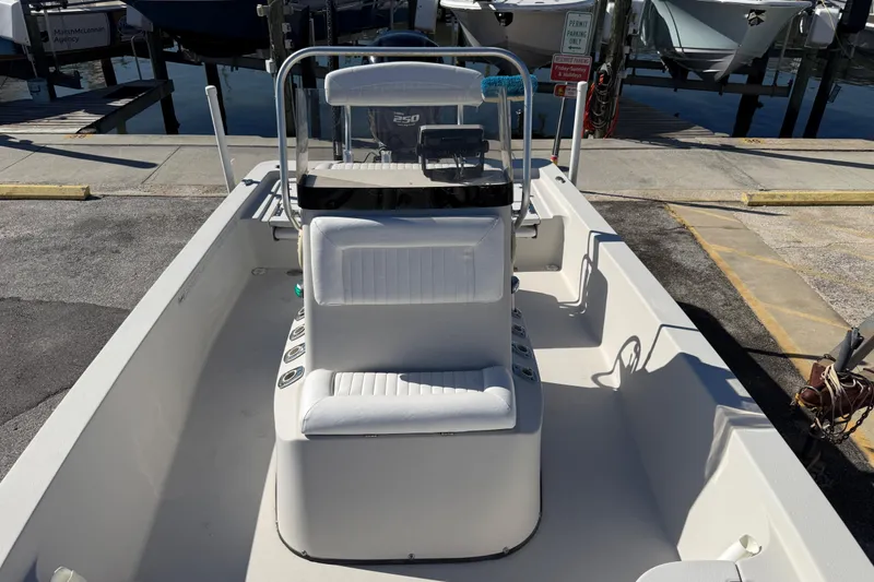 Slide: The Image of 2017 Blazer Bay 2220 Fisherman boat with center console and seating at dock. - 9