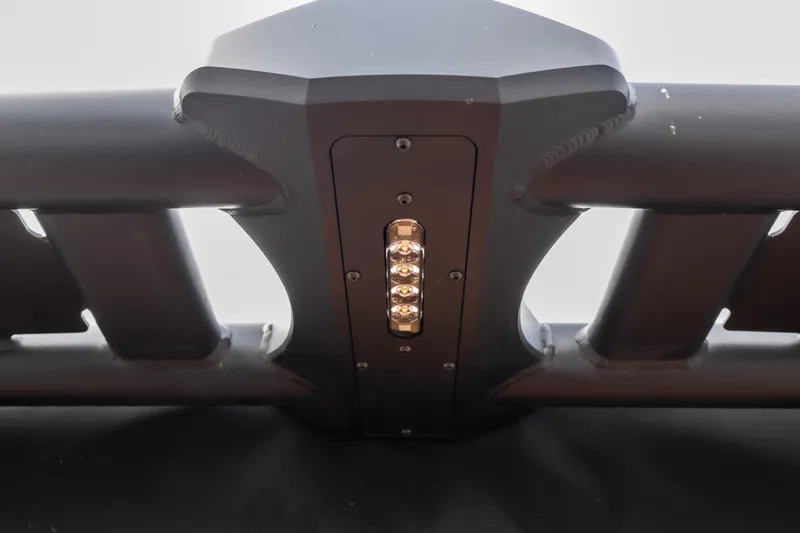 Slide: The Image of 2026 MB B52 23 Classic boat interior with open storage compartment and tan seating. - 29