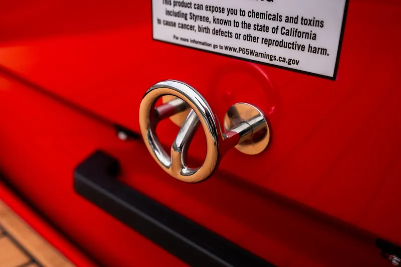 Slide: The Image of 2026 MB B52 23 Classic boat deck with safety warning label. - 5