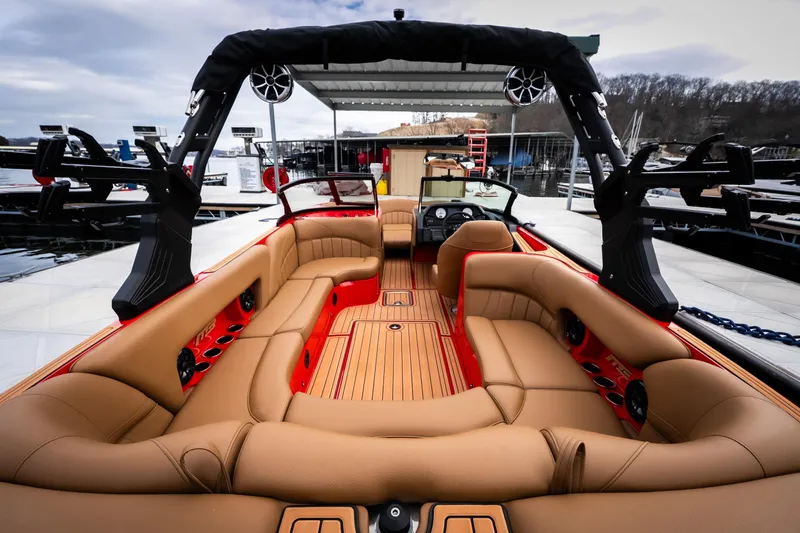 Slide: The Image of Luxurious interior of 2026 MB B52 23 Classic boat with tan leather seating. - 7