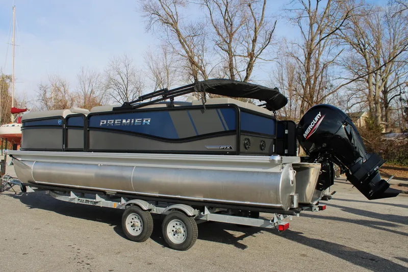 The Image of 2026 Premier 210 Sunsation RE XSD pontoon boat on trailer. - 0