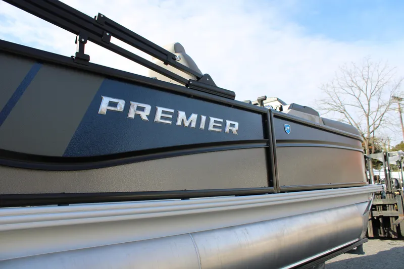 Slide: The Image of 2026 Premier 210 Sunsation RE XSD pontoon boat, sleek design, side view. - 2