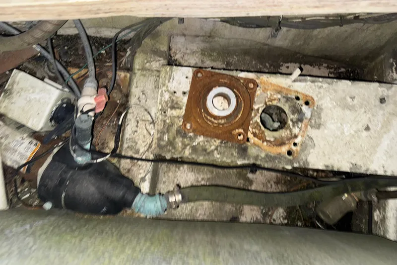 Slide: The Image of Engine compartment of a 1995 Bertram 46 Moppie, showing mechanical components and wiring. - 40