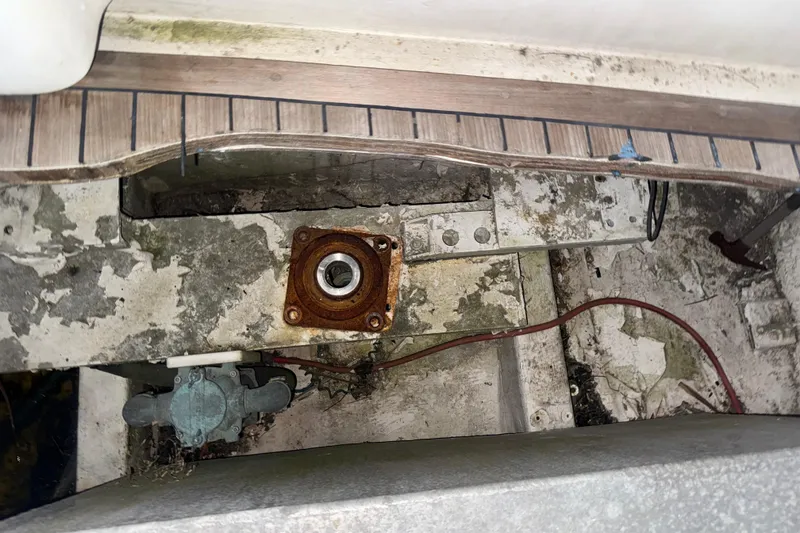 Slide: The Image of Rusty engine mount area on a 1995 Bertram 46 Moppie boat. - 41