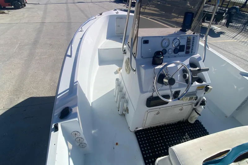 Slide: The Image of 1999 Pro Sports 1850 CC boat interior with steering console and gauges. - 11