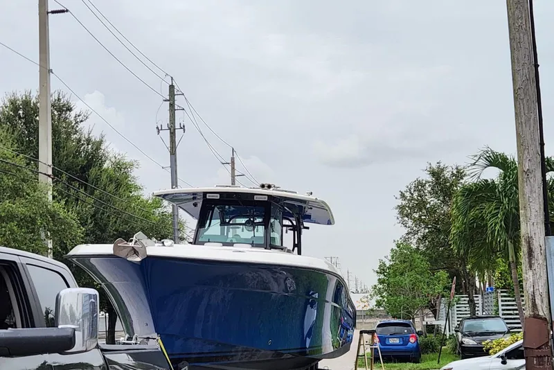 Slide: The Image of 2017 Hydra-Sports 4200 Siesta boat on trailer, parked on a street. - 28