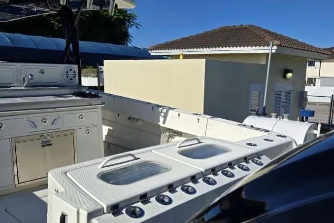 Slide: The Image of 2017 Hydra-Sports 4200 Siesta boat deck with controls. - 5