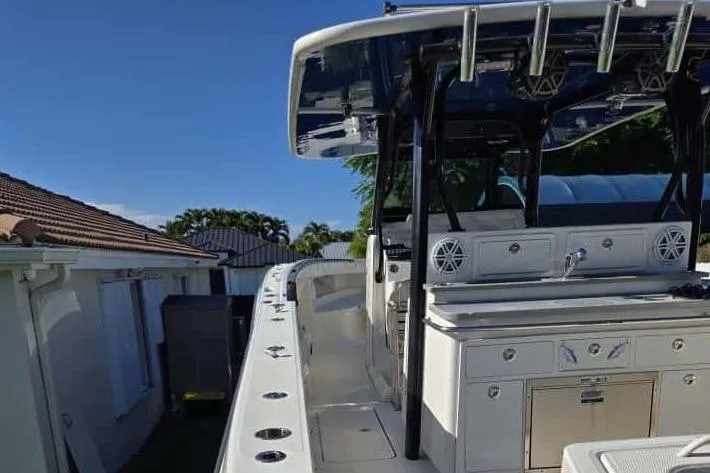 Slide: The Image of 2017 Hydra-Sports 4200 Siesta boat, side view, sunny day. - 6