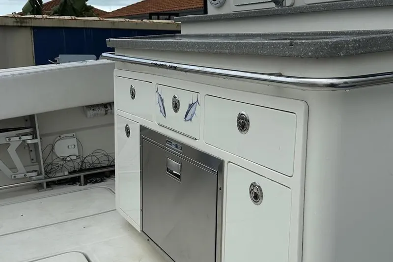 Slide: The Image of 2017 Hydra-Sports 4200 Siesta boat interior with storage and countertop. - 7