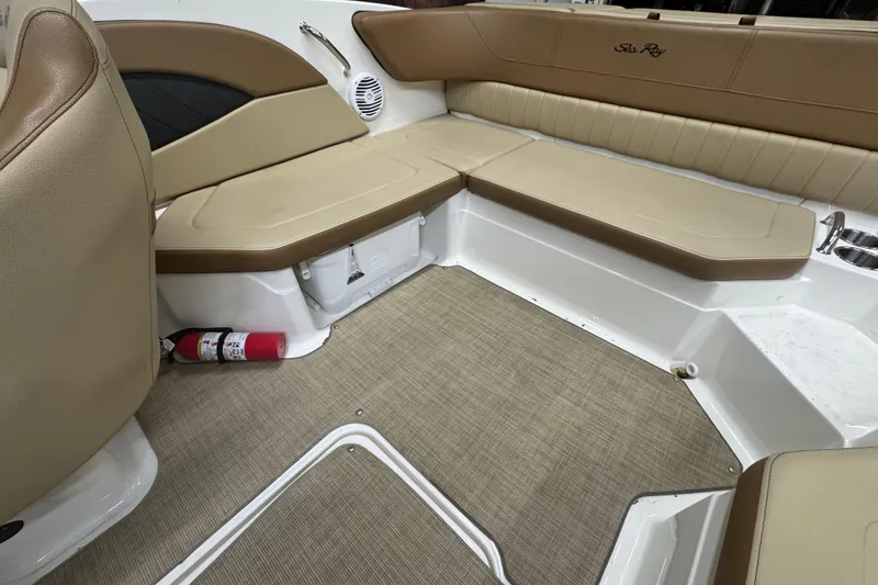 Slide: The Image of Close-up of 2018 Sea Ray SPX 210 Outboard dashboard gauges displaying RPM and hours. - 12