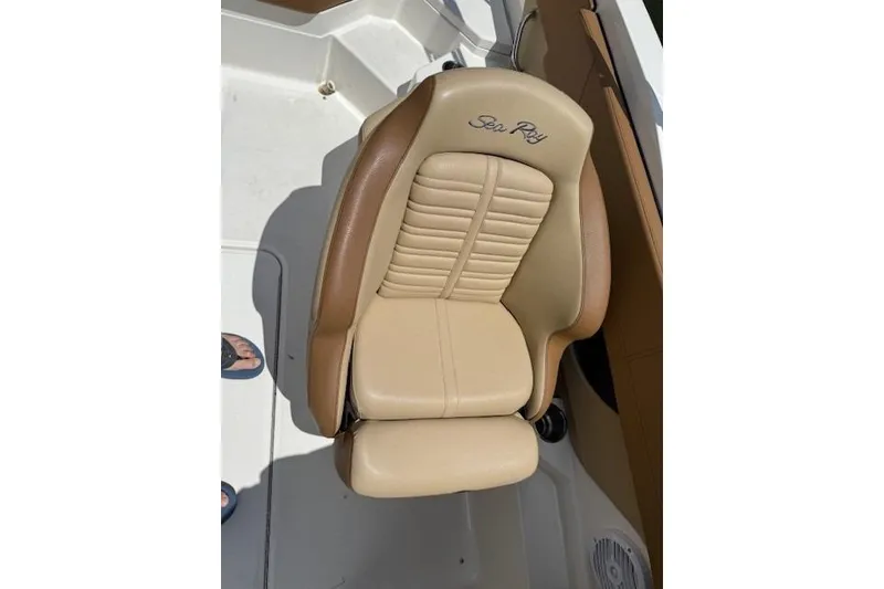 Slide: The Image of Beige leather seat on 2018 Sea Ray SPX 210 Outboard boat. - 17