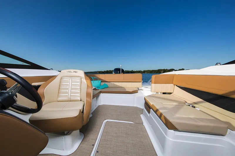 Slide: The Image of Manufacturer Provided Image: 2018 Sea Ray SPX 210 OB boat interior with steering wheel and dashboard. - 3