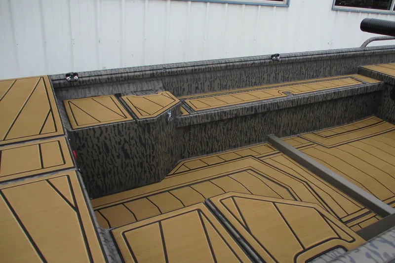 Slide: The Image of 2026 Gator Tail 1750 SAVAGE MIDDECK boat interior with custom flooring design. - 10