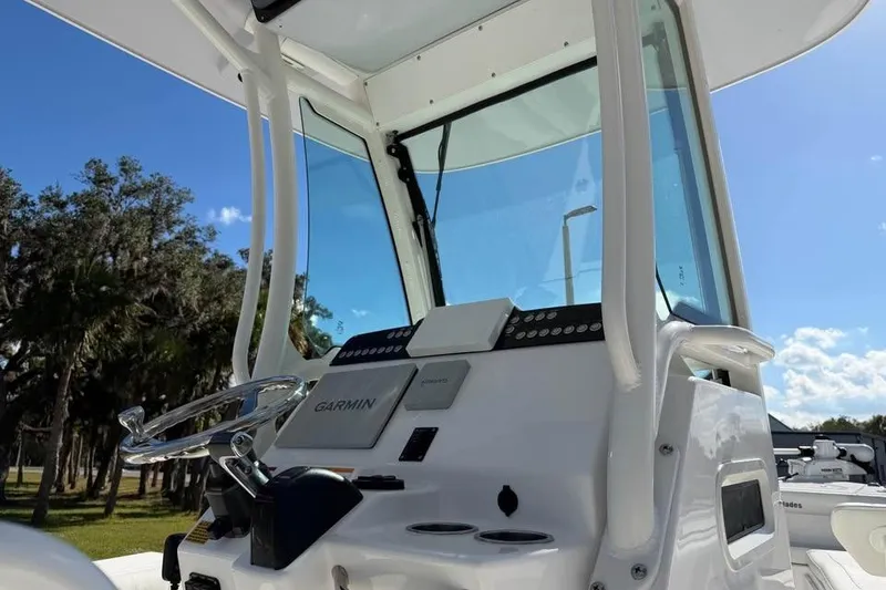 Slide: The Image of 2020 Everglades 253 Center Console boat helm with Garmin navigation system. - 14