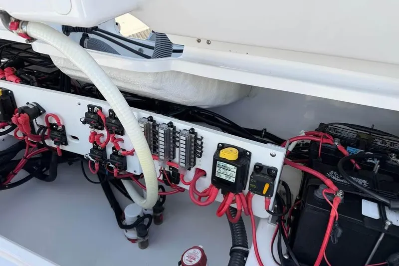Slide: The Image of Electrical wiring and components inside a 2020 Everglades 253 Center Console boat. - 17