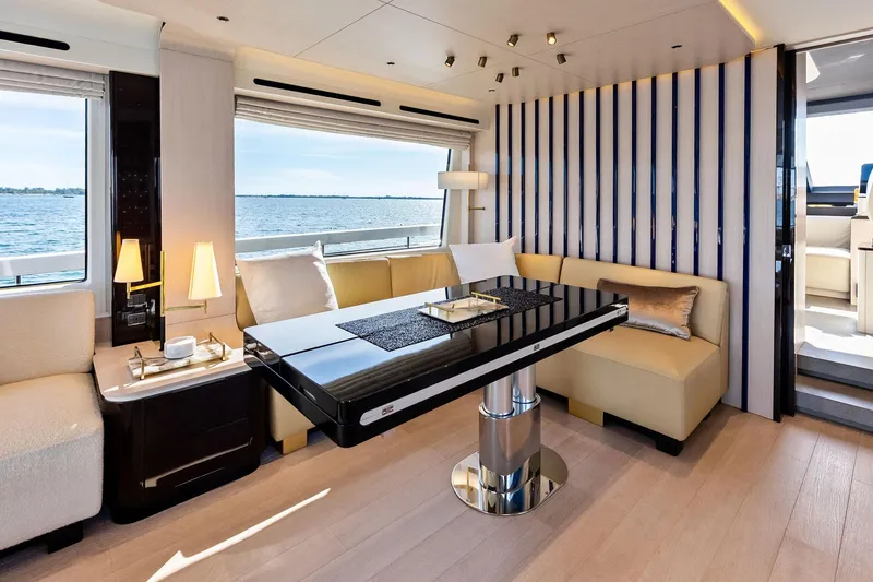 Slide: The Image of Luxurious interior of 2021 Azimut Fly 78 yacht with elegant seating and ocean view. - 13