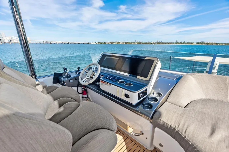 Slide: The Image of Luxurious helm of 2021 Azimut Fly 78 yacht with ocean view. - 33