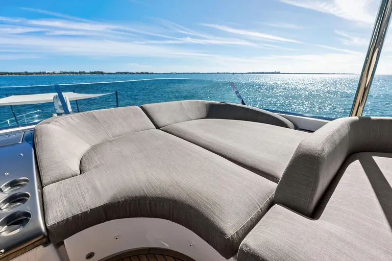 Slide: The Image of Luxurious sunbed on 2021 Azimut Fly 78 yacht overlooking serene ocean view. - 35