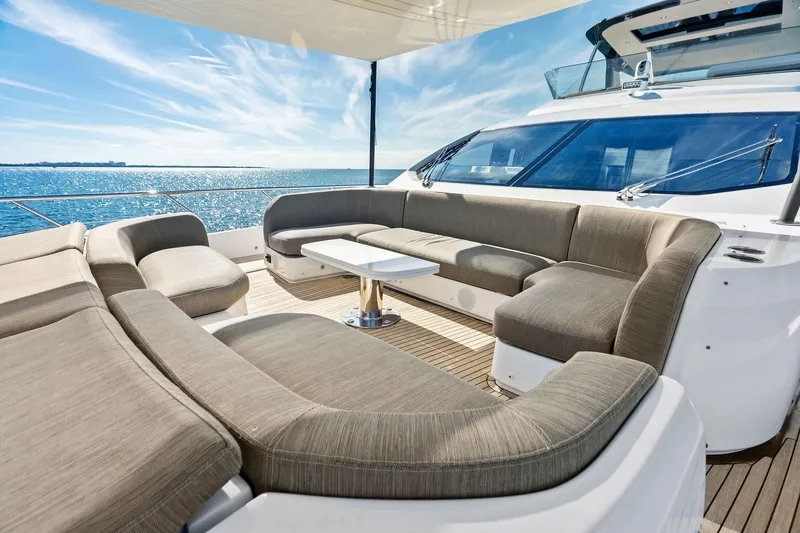 Slide: The Image of Luxurious 2021 Azimut Fly 78 yacht deck with elegant seating and ocean view. - 39