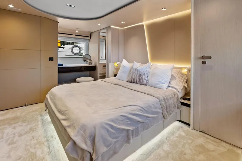 Slide: The Image of Luxurious bedroom interior of 2021 Azimut Fly 78 yacht with modern design and ambient lighting. - 42