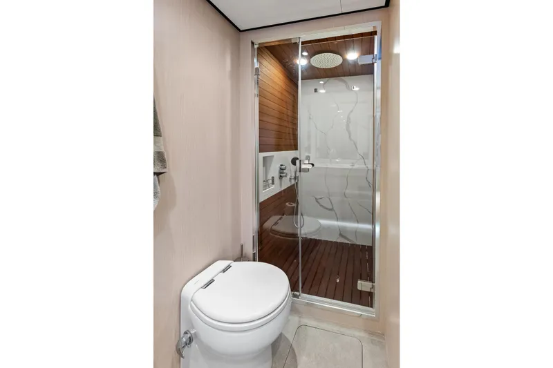 Slide: The Image of Luxurious bathroom in 2021 Azimut Fly 78 yacht with modern shower and toilet. - 43