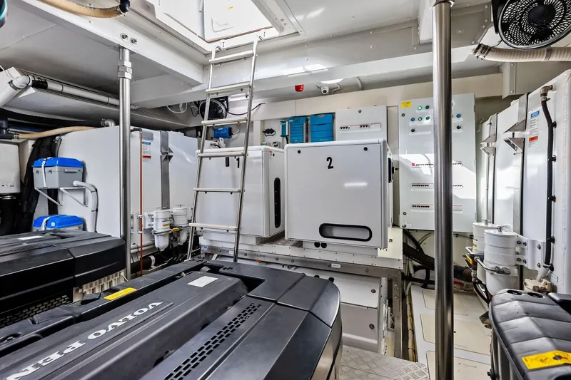Slide: The Image of Engine room of 2021 Azimut Fly 78 yacht with Volvo Penta engines and control panels. - 58