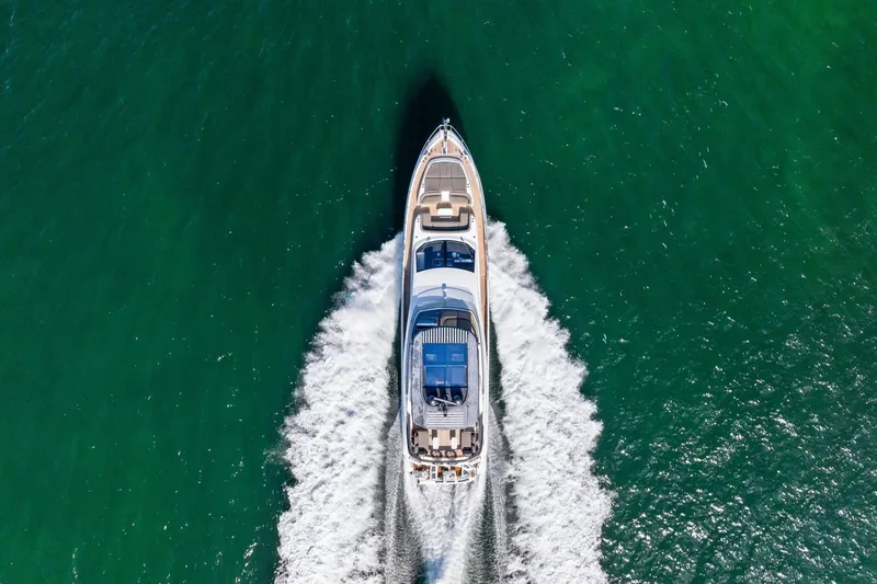 Slide: The Image of Azimut Fly 78 yacht cruising on open water, aerial view, 2021 model. - 72