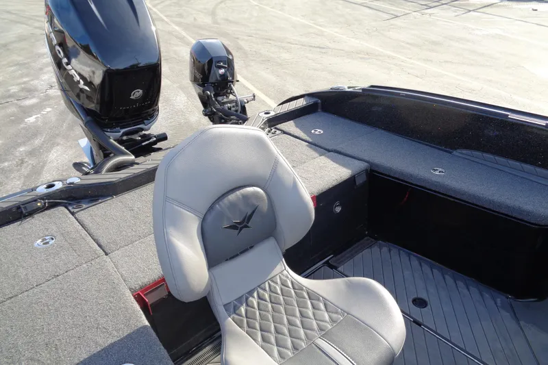 Slide: The Image of 2022 Vexus DVX 22 boat interior with seating and motor detail. - 27