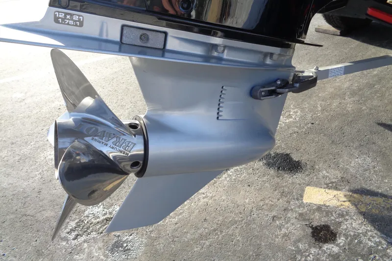 Slide: The Image of Close-up of a 2022 Vexus DVX 22 boat propeller on a concrete surface. - 34