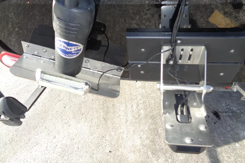 Slide: The Image of 2022 Vexus DVX 22 boat transom with Bennett Marine trim tab and LED light. - 35