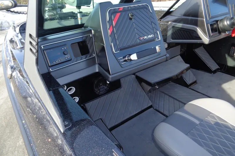 Slide: The Image of 2022 Vexus DVX 22 boat interior with modern dashboard and seating. - 38