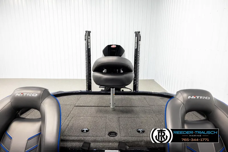 Slide: The Image of 2024 Bass Tracker Nitro Z20 boat interior with seating and Minn Kota trolling motor. - 19