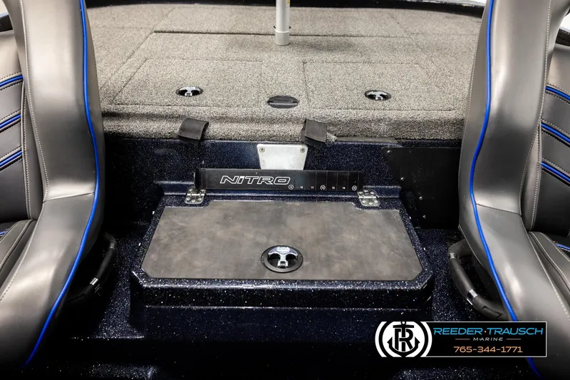 Slide: The Image of 2024 Bass Tracker NitroZ20 boat interior with seating and storage. - 24