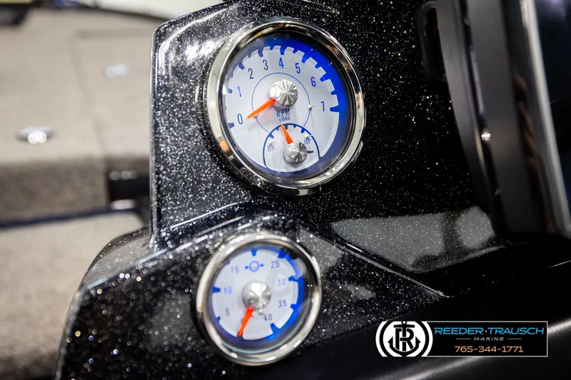 Slide: The Image of 2024 Bass Tracker NitroZ20 dashboard with RPM and speed gauges. - 30