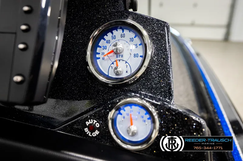 Slide: The Image of 2024 Bass Tracker Nitro Z20 dashboard with speedometer and auto bilge indicator. - 32