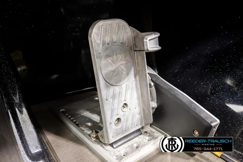 Slide: The Image of Close-up of 2024 Bass Tracker NitroZ20 boat pedal with star design. - 36