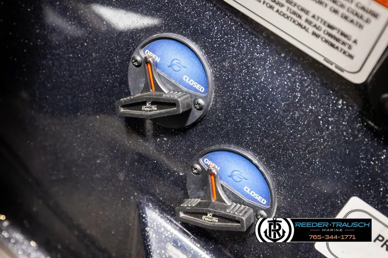 Slide: The Image of 2024 Bass Tracker NitroZ20 boat controls with open and closed indicators. - 39