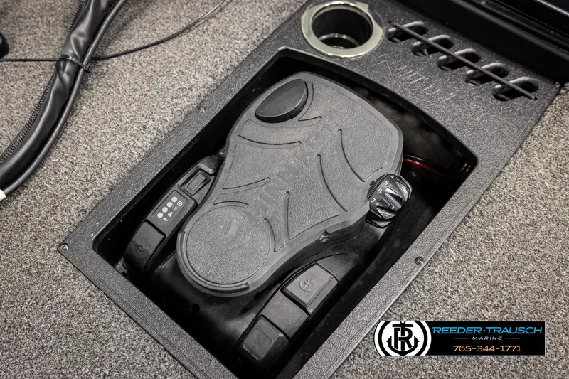 Slide: The Image of 2024 Bass Tracker Nitro Z20 foot pedal control on carpeted boat deck. - 47